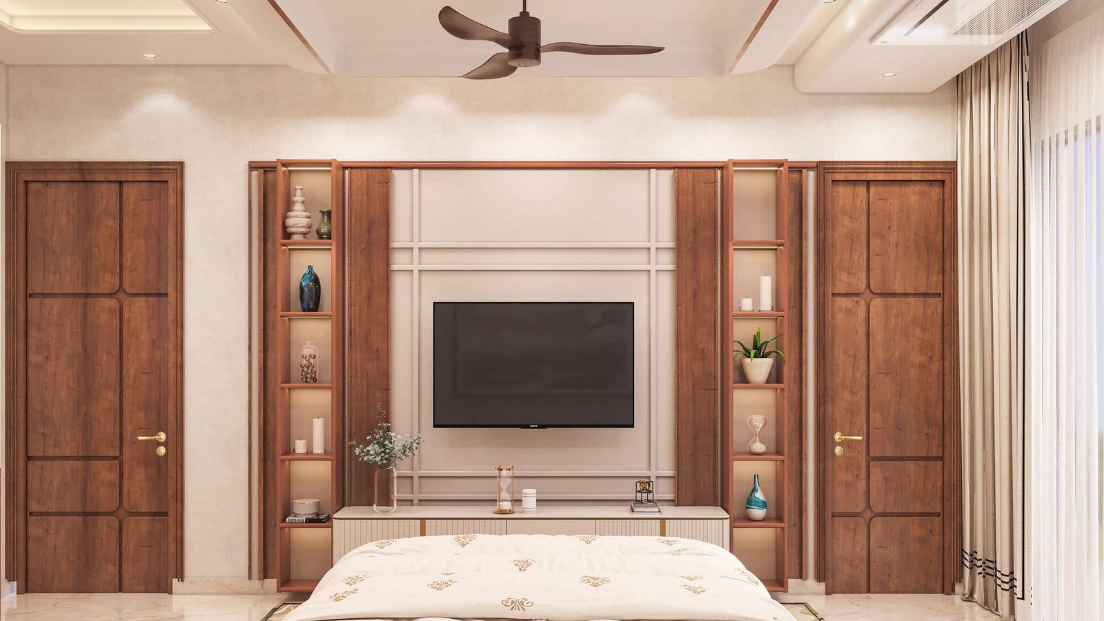 Second bedroom at Anubhuti — symmetrical media wall with two walnut display niches flanked by matching panelled doors