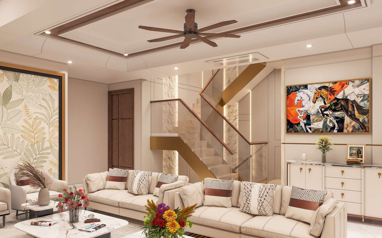 Living area at Anubhuti — cream sofas and a running-horses canvas beside the open staircase with a stone-clad feature wall
